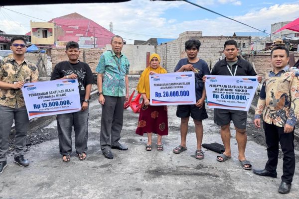 BRI Insurance Bayar Klaim Asuransi kepada UMKM Korban Kebakaran di Palu